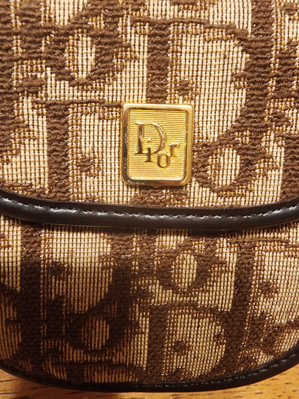 vintage Christian Dior coin purse features the iconic brown Trotter canvas mono